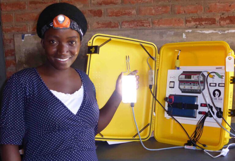Judith Neilson Foundation - We Care Solar. malawi-health-worker-with-solar-suitcase